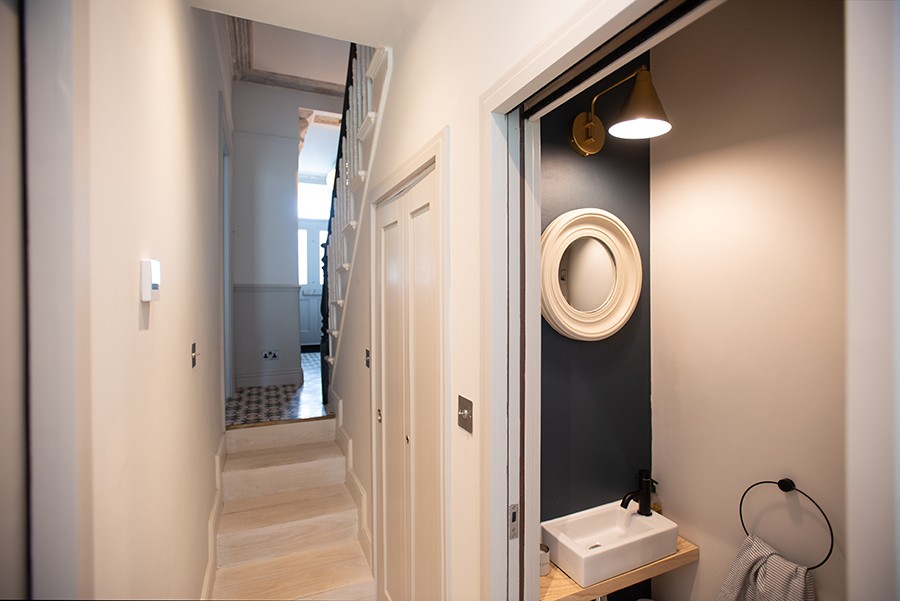 Pocket doors help with compact bathrooms.