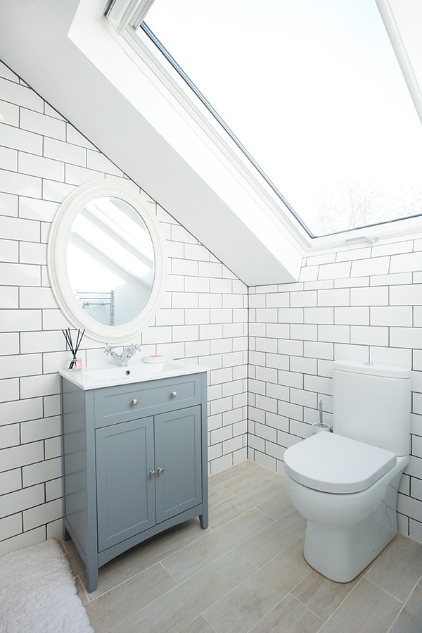 Using the space under the eaves can help compact bathrooms.
