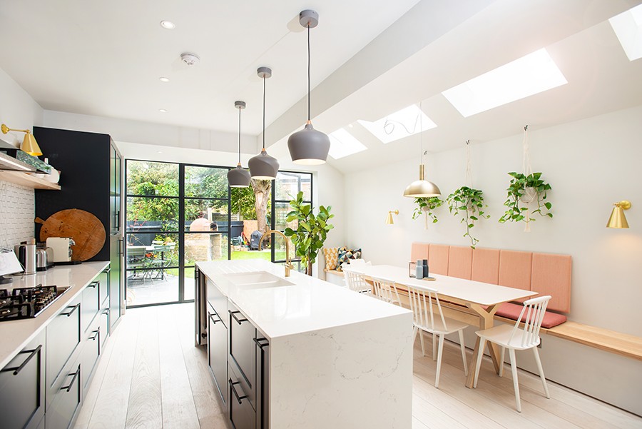 A kitchen island can help divide up open plan space.