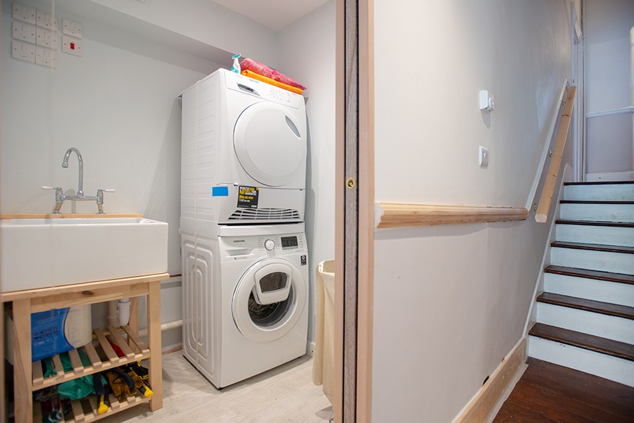 A utility room's importance shown through 'out of sight, out of mind'.