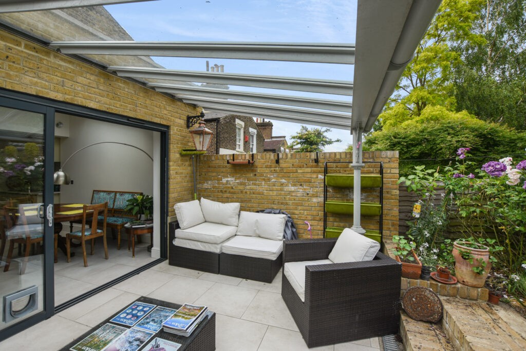 Extending your home by bringing the outside in with a garden feeling like an extra room.