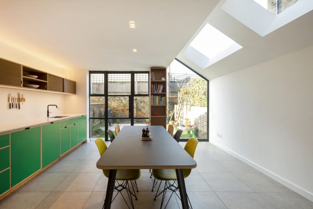 Bespoke glazing, such as a triangular window, is an alternative to bifold doors.