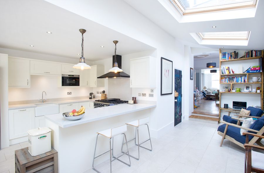Downlights zoning certain areas in the kitchen extension