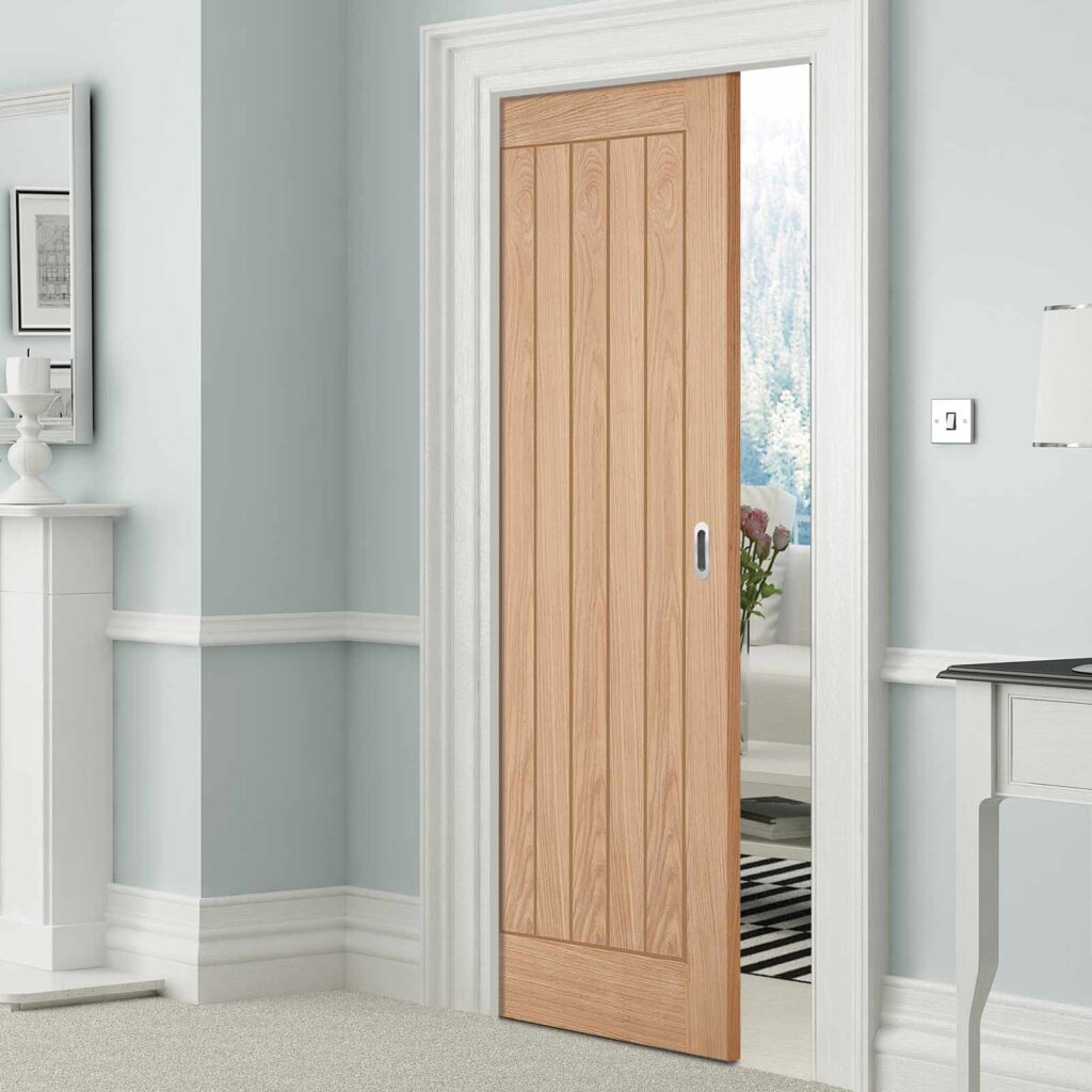 Pocket doors in extensions or conversions : Single pocket door in light wood.