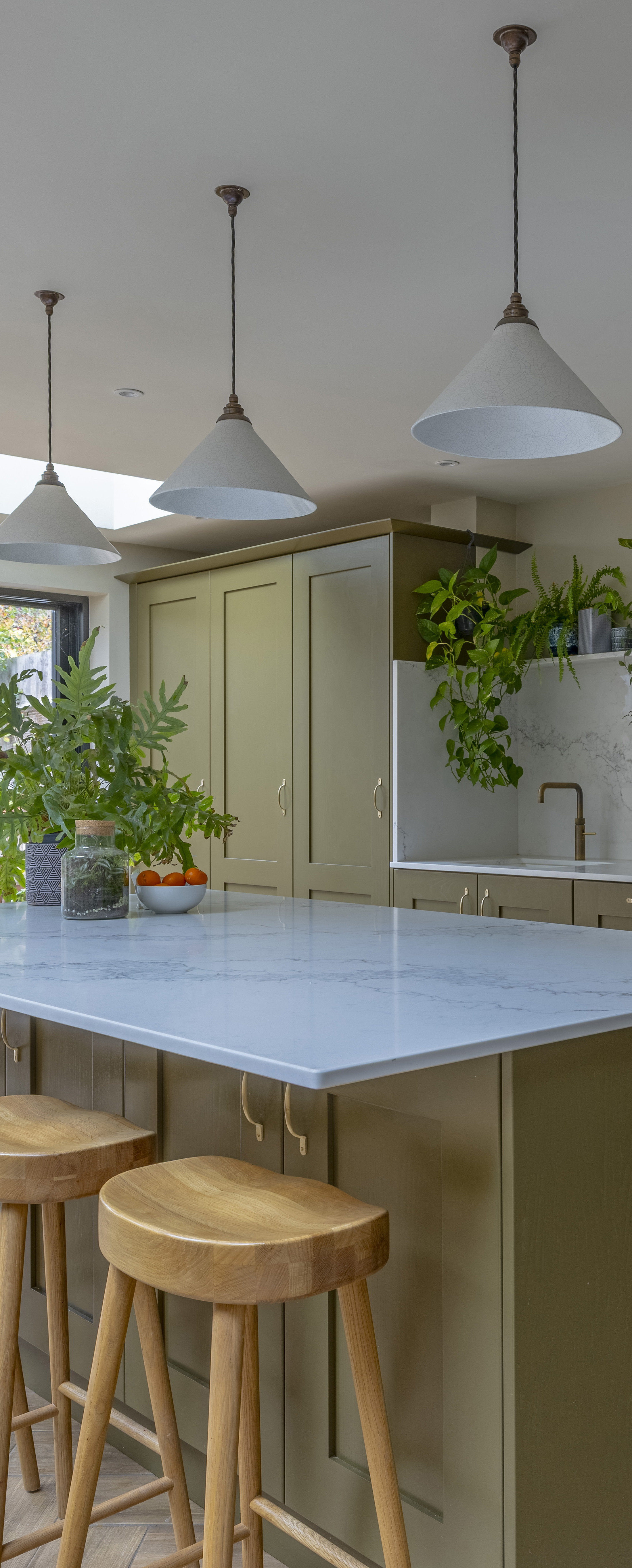 Open-plan kitchen with olive green cabinetry and herringbone floor, wraparound extension Mayfield Road N8