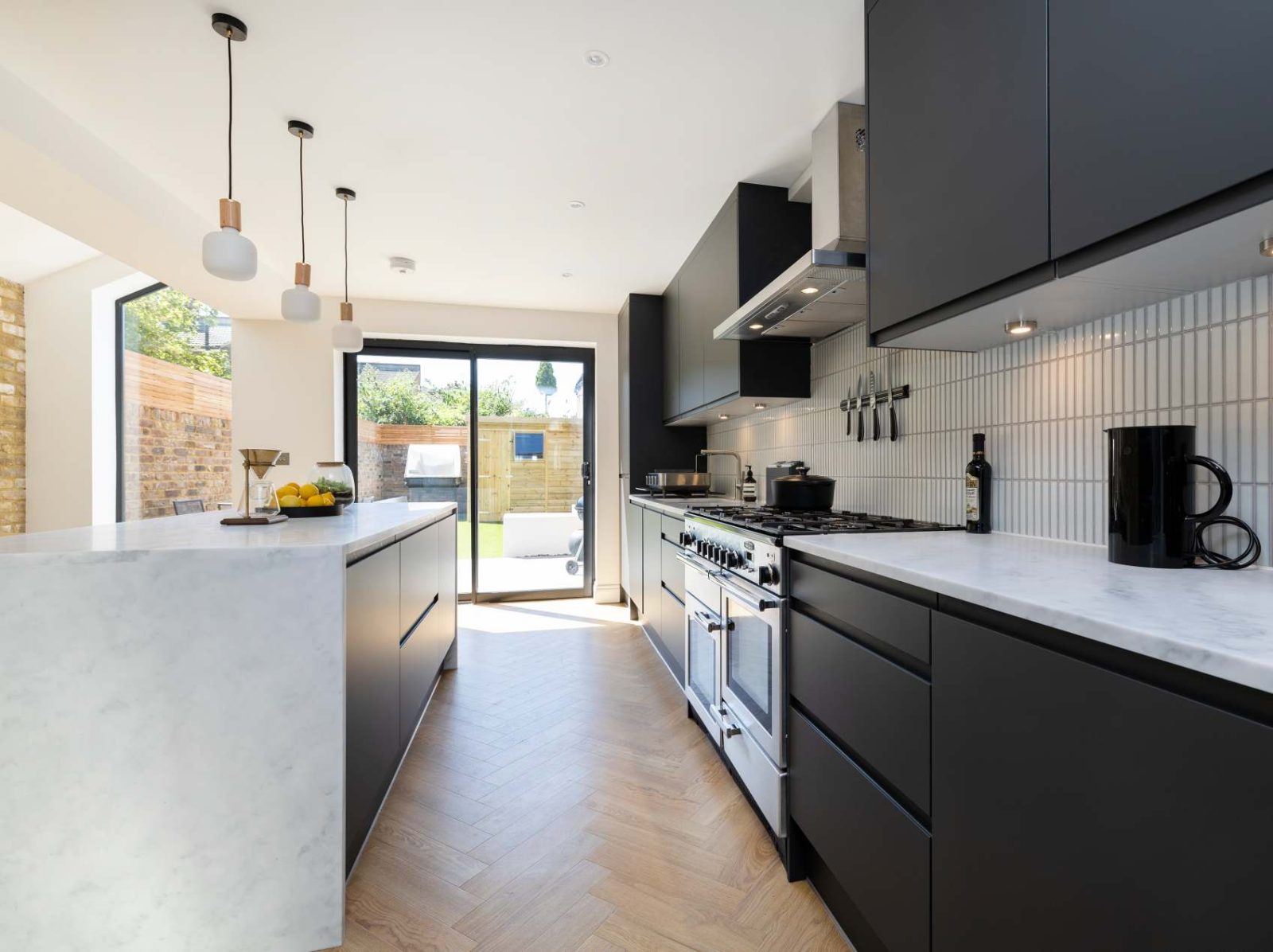 Wide view of the open-plan kitchen and dining space at Antill Road N15