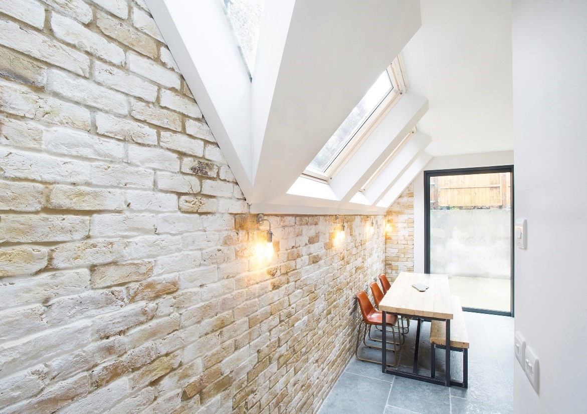 Extension with an exposed brick feature wall
