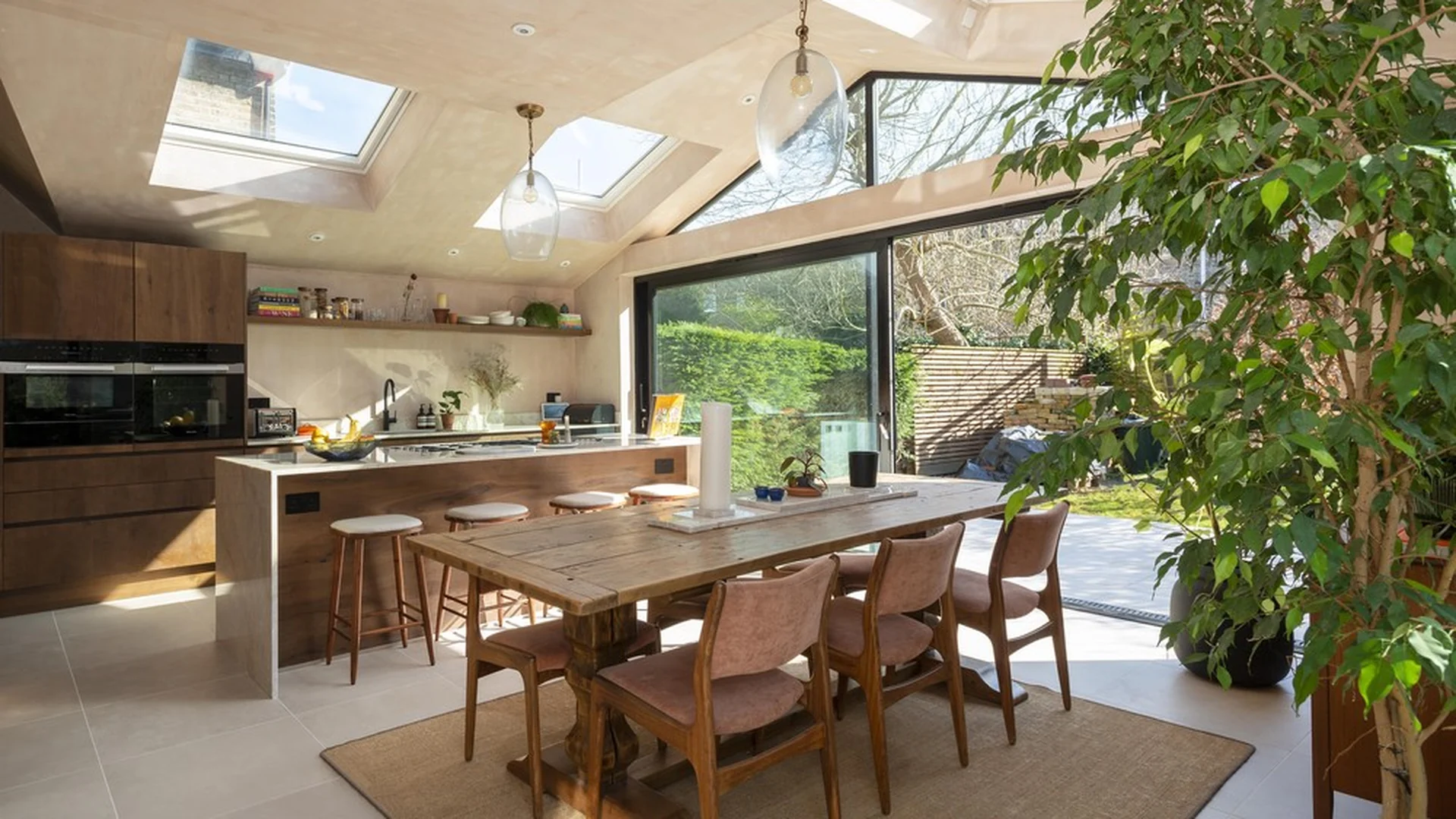 Open-plan kitchen extension with rooflights at Charleville Circus, Sydenham SE26