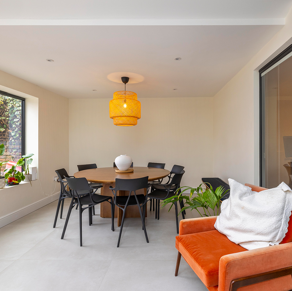 Crittall-style doors open from the kitchen onto the garden patio at Bonham Road