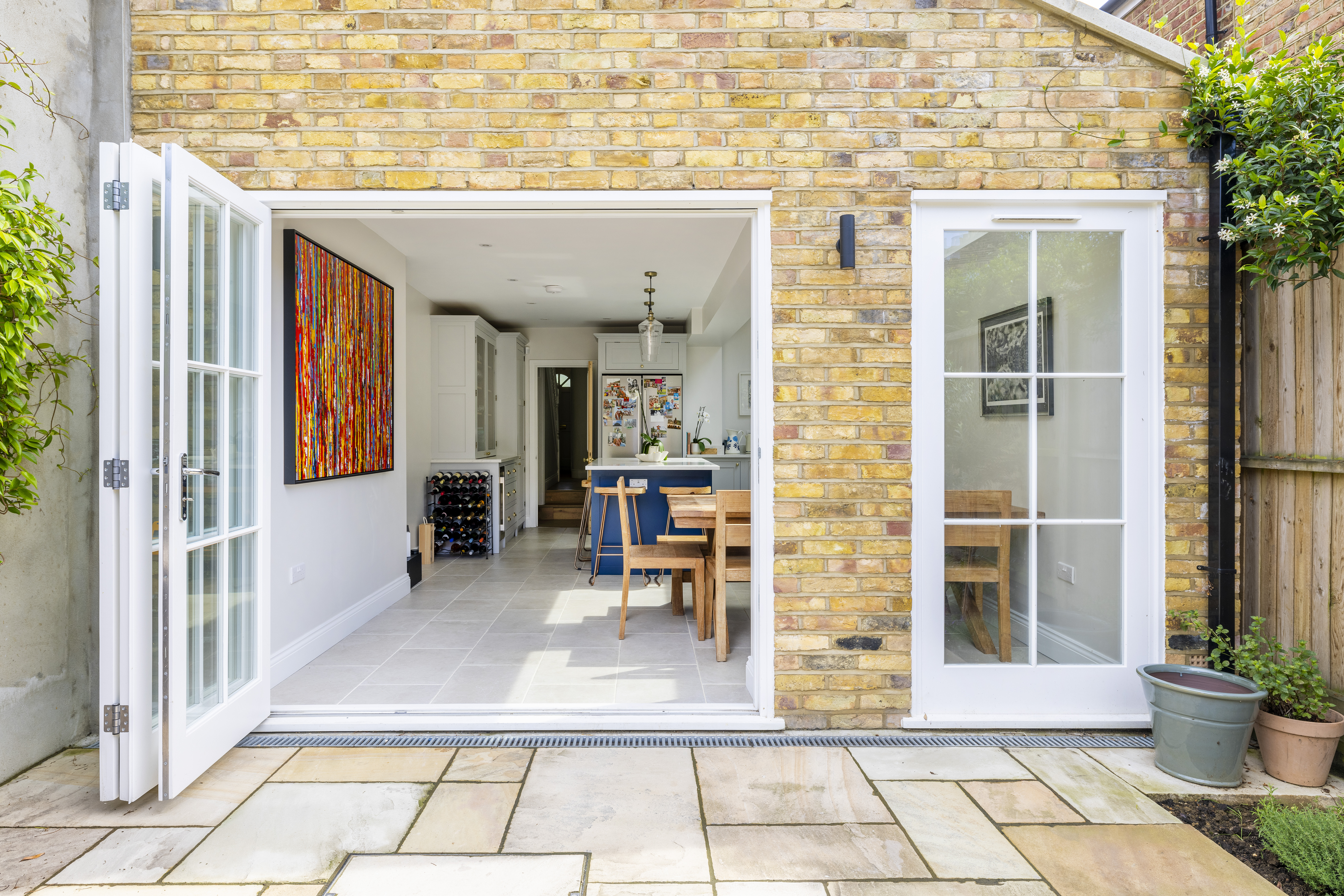 Kitchen island doubling as a dining table at Milton Road SE24