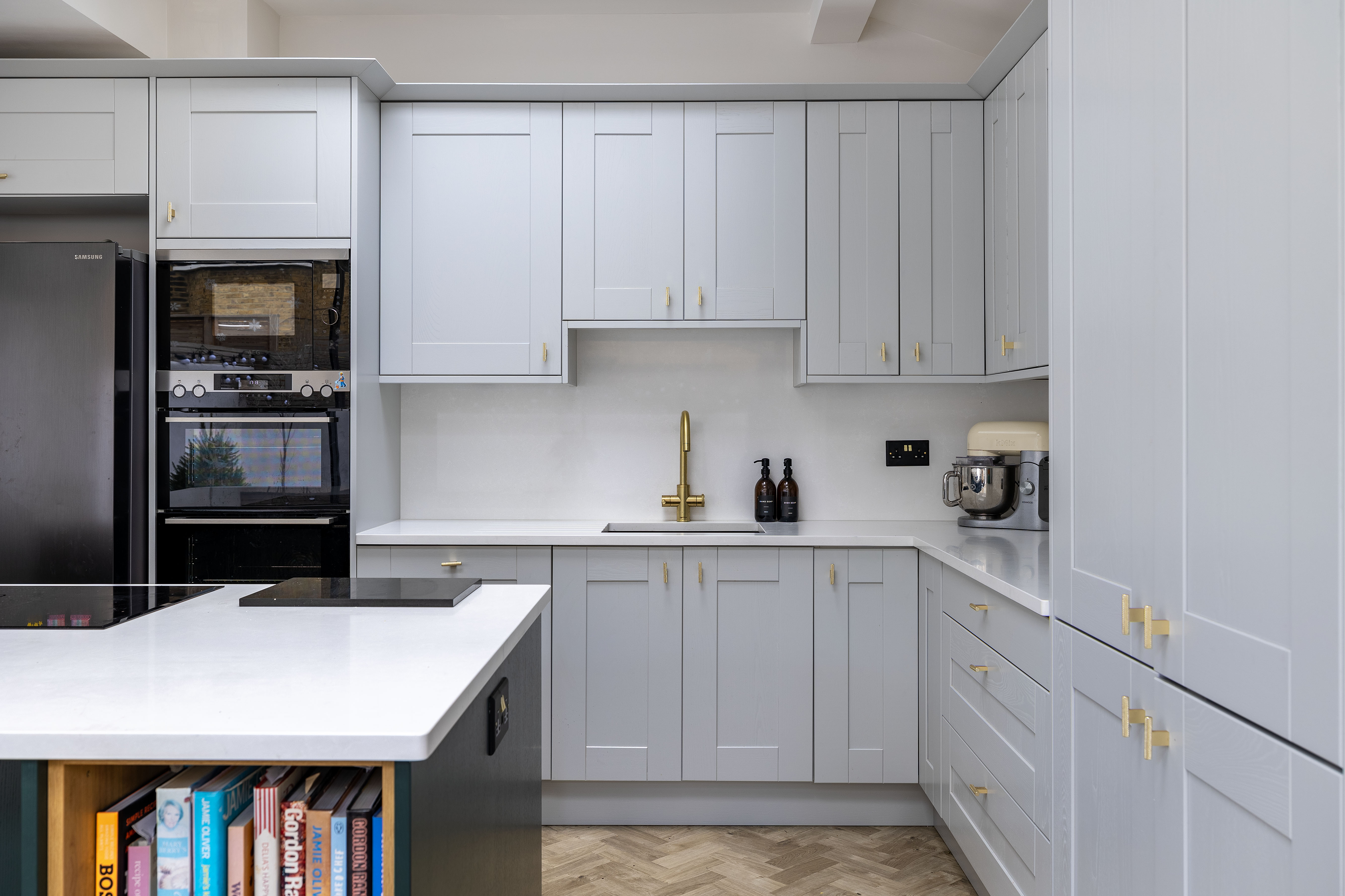 Sliding doors open from the kitchen onto the courtyard garden at Heber Road SE22